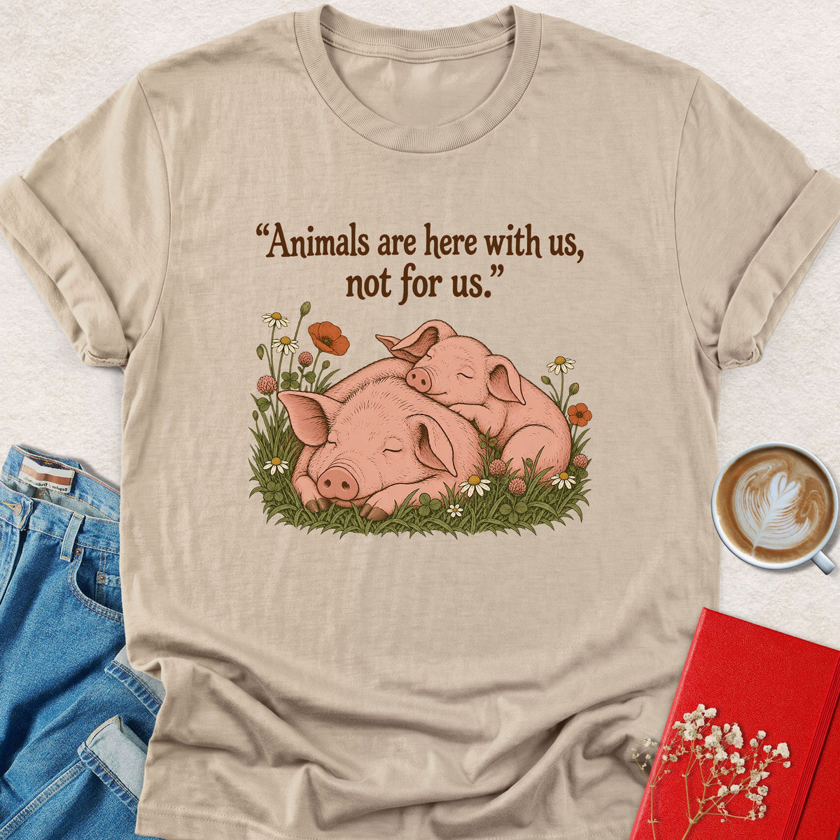 Sand heather T-shirt with sleeping pigs graphic on front