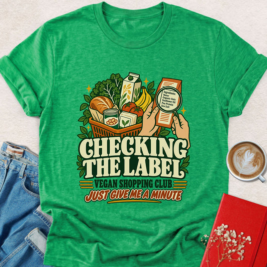 Green vegan graphic t-shirt with 'CHECKING THE LABEL' front text