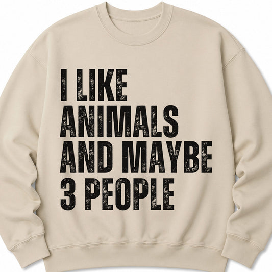 Sand crewneck sweatshirt with front graphic text: I LIKE ANIMALS AND MAYBE 3 PEOPLE