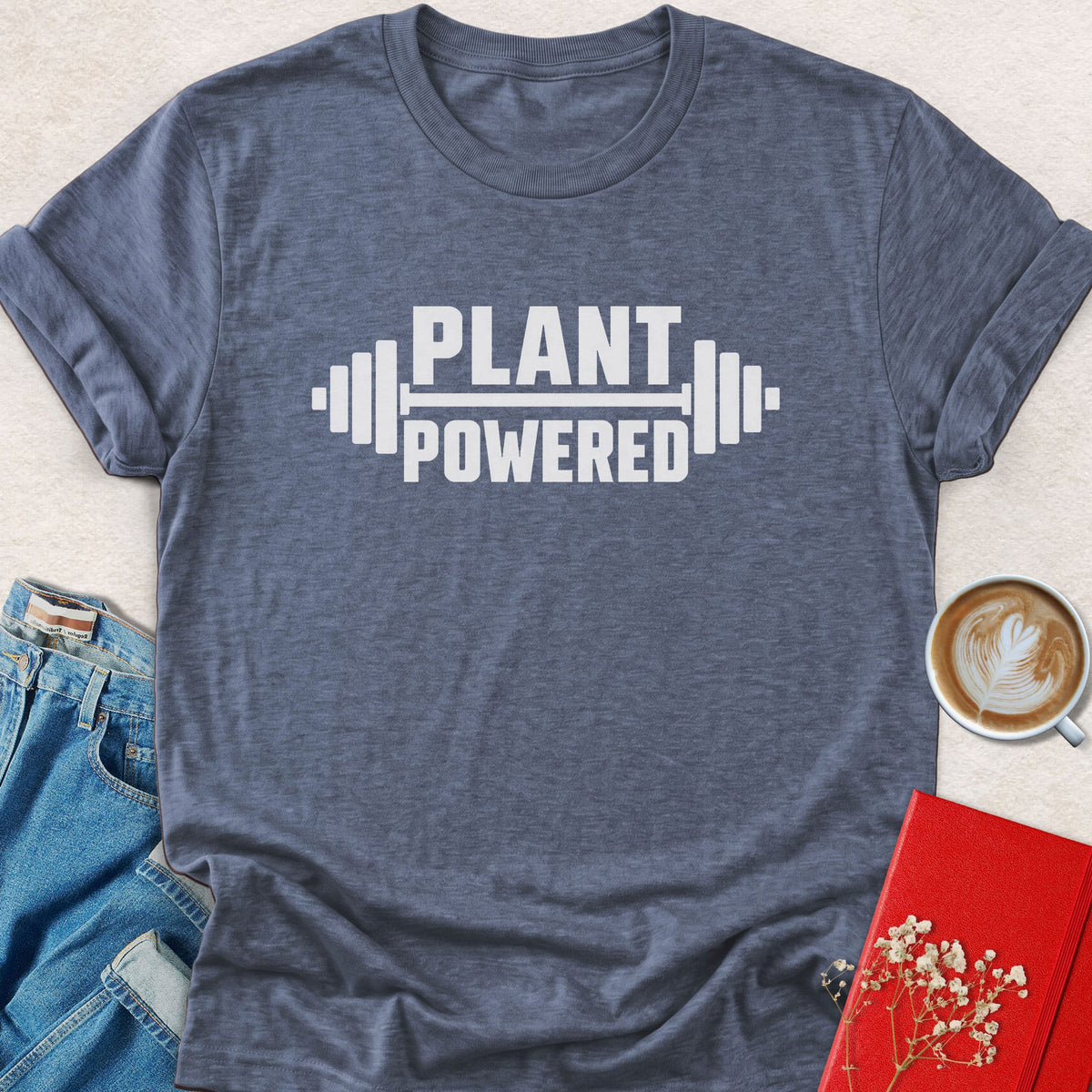 Barbell graphic t-shirt with "PLANT POWERED" print, heather blue