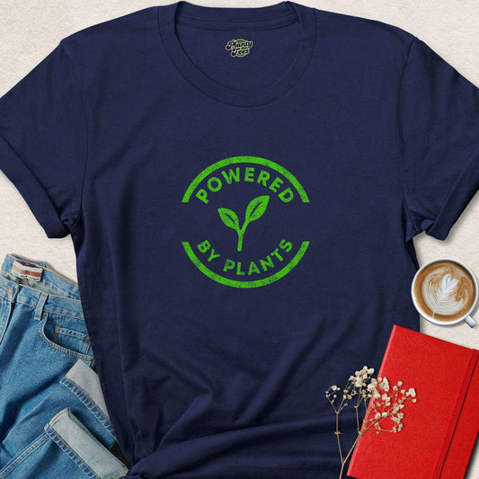 Navy graphic T-shirt with green leaf “Powered by Plants” logo at center