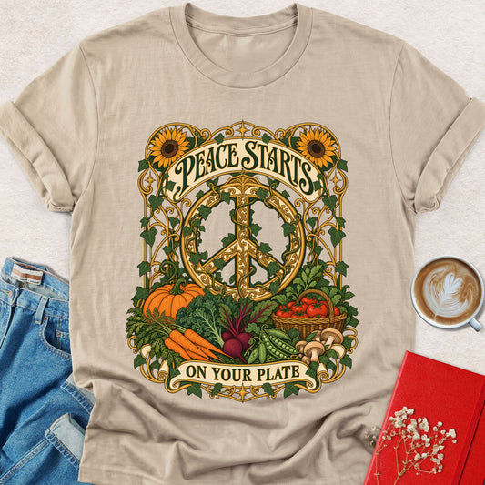 Sand t-shirt with circular peace-and-anchor graphic reading Peace Starts on Your Plate