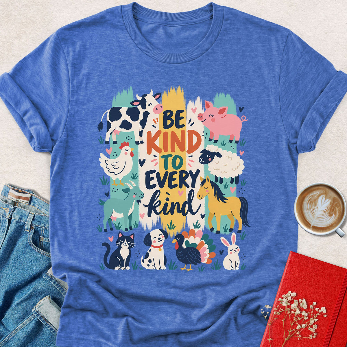 Heather royal blue animal graphic T-shirt with 'Be kind to every kind' typography