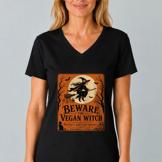 V-neck T-shirt in black with orange witch graphic reading “Beware the Vegan Witch”