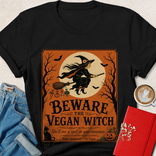 Black unisex T-shirt with witch graphic and BEWARE THE VEGAN WITCH lettering