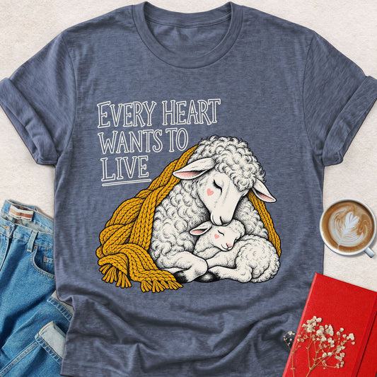 Heather blue t-shirt with lamb-and-heart print and 'Every Heart Wants To Live' text