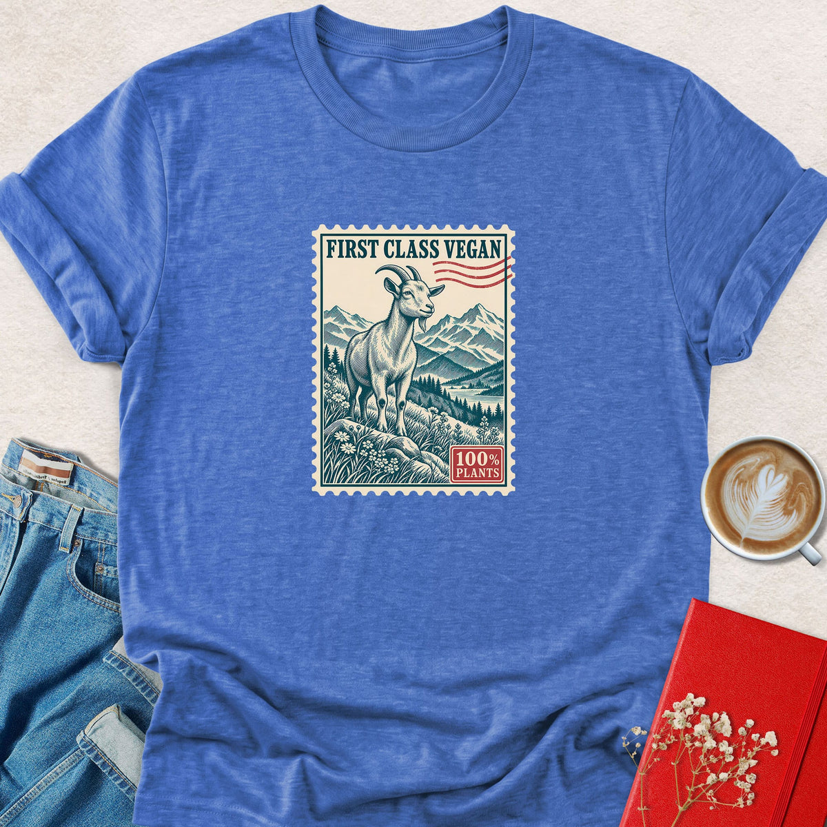 Blue crew-neck short-sleeve t-shirt with rectangular goat stamp graphic