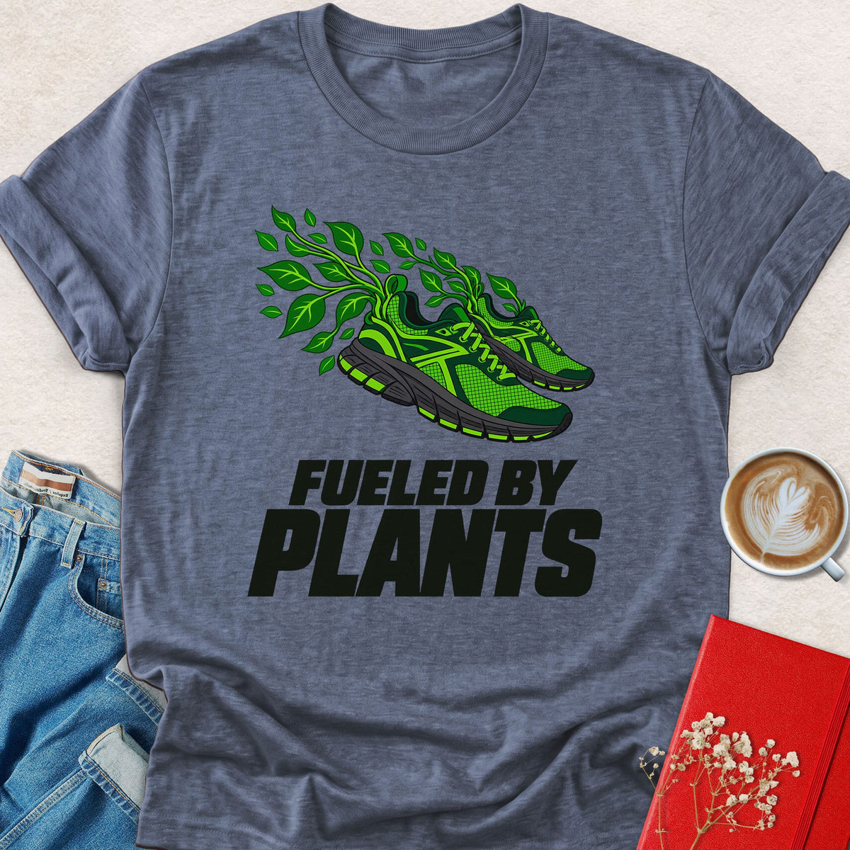 Charcoal heather graphic T-shirt with green plant sneaker and 'Fueled by Plants' print