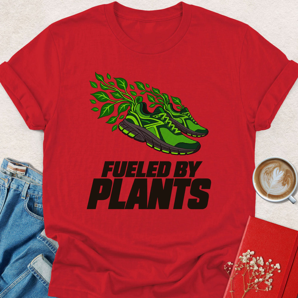 Red graphic T-shirt with green plant sneaker and 'Fueled by Plants' print