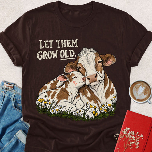 Dark brown crew-neck cow graphic t-shirt with “Let Them Grow Old” front print