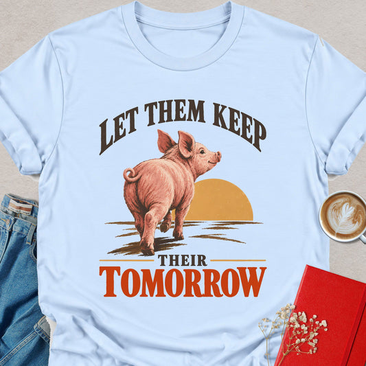 Light Blue T-shirt with piglet graphic and 'Let Them Keep Their Tomorrow' print