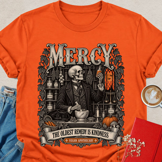 Orange crewneck t-shirt with centered black-and-orange vintage Halloween graphic print