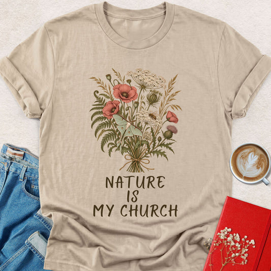 Graphic T-shirt in sand color with floral bouquet and 'NATURE IS MY CHURCH' text