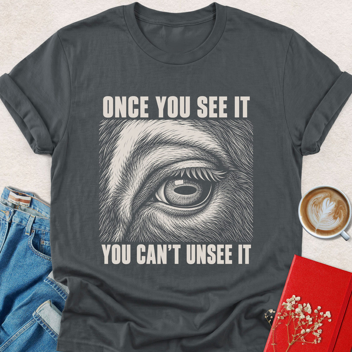 Charcoal crewneck T-shirt with animal eye graphic and 'Once You See It' text