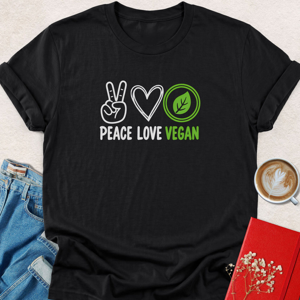 Black peace sign graphic T-shirt with Peace Love Vegan lettering and heart-circle icons