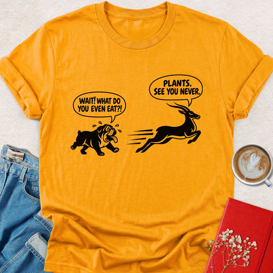 Orange plant joke T-shirt with plant-and-rabbit graphic and printed slogans