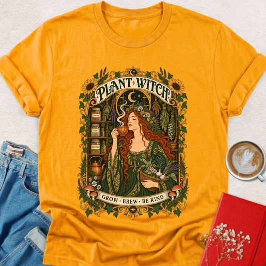 Gold graphic t-shirt with ornate plant-witch illustration on chest