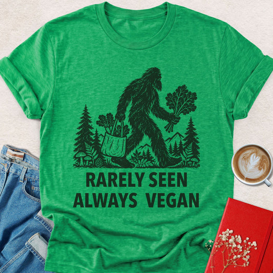 Green Bigfoot graphic t-shirt with 'RARELY SEEN ALWAYS VEGAN' print