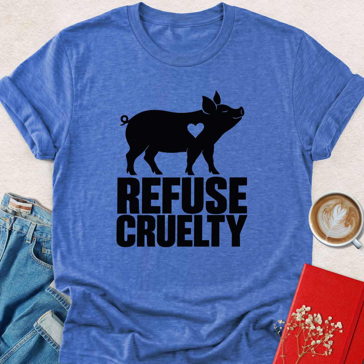 Royal blue pig heart T-shirt with 'REFUSE CRUELTY' lettering