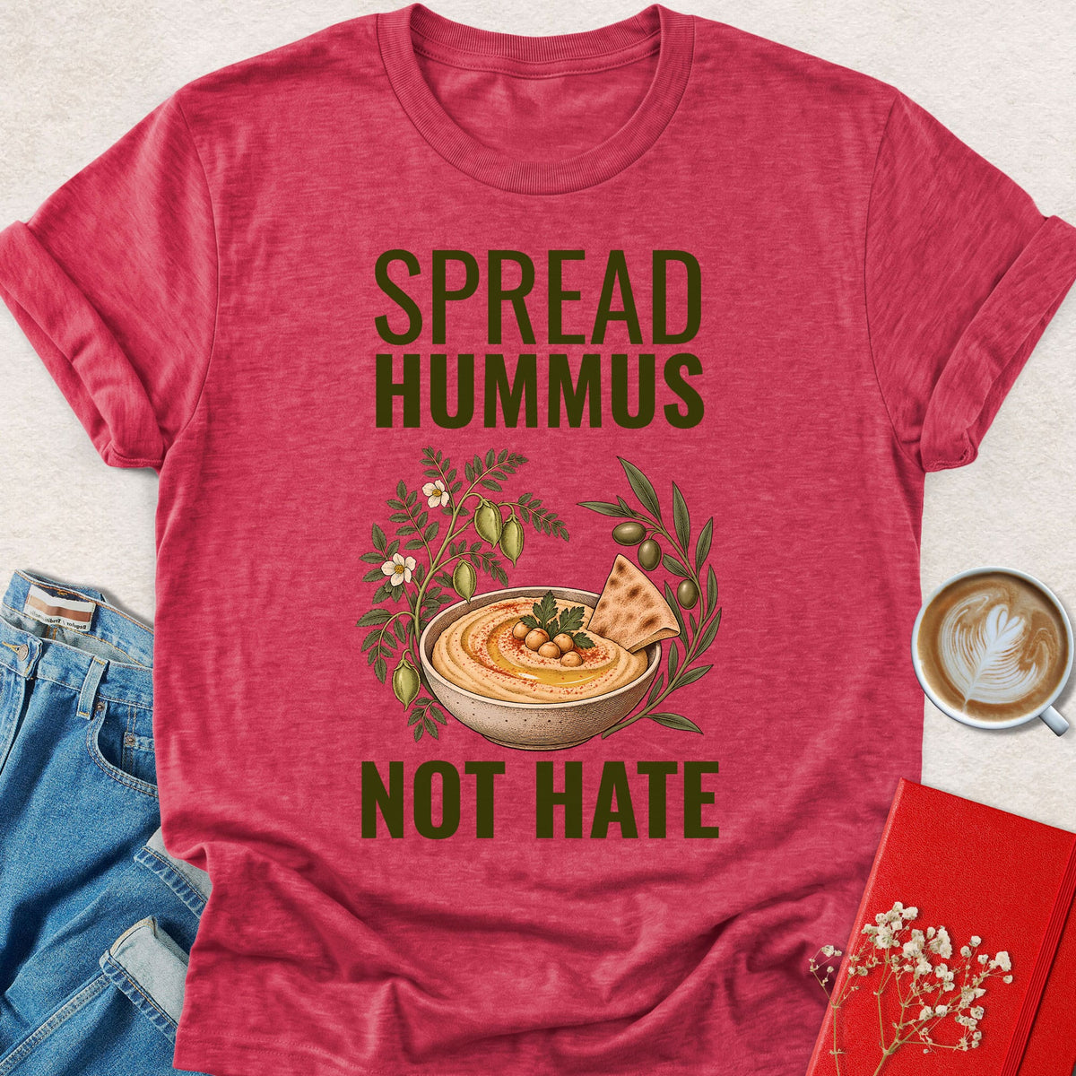 Red crewneck T-shirt with 'SPREAD HUMMUS'/'NOT HATE' slogan and hummus graphic.