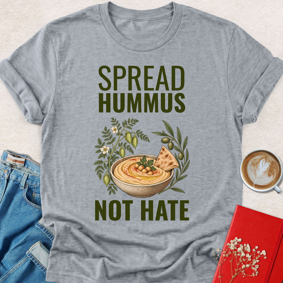 Heather gray crewneck T-shirt with 'SPREAD HUMMUS'/'NOT HATE' slogan and hummus graphic.