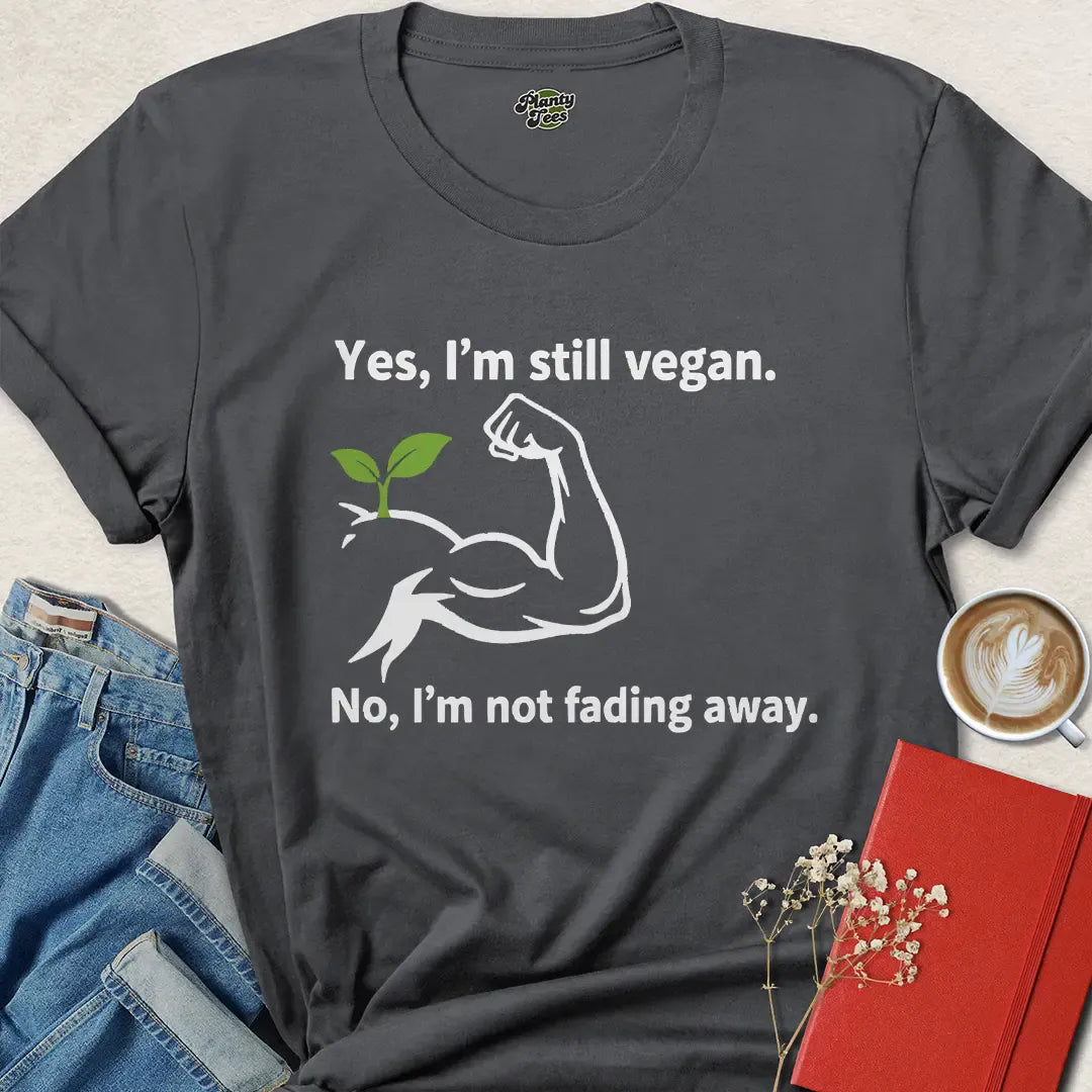 Strong Vegan Shirt – Still Vegan, Not Fading Away Tee with Plant Muscle Graphic | Eco + Cruelty-Free | Limited-Time Drop
