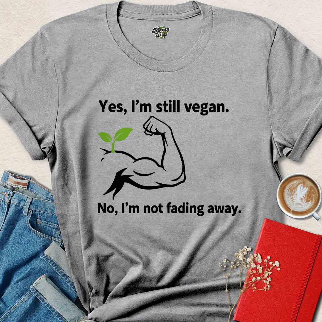 Strong Vegan Shirt – Still Vegan, Not Fading Away Tee with Plant Muscle Graphic | Eco + Cruelty-Free | Limited-Time Drop
