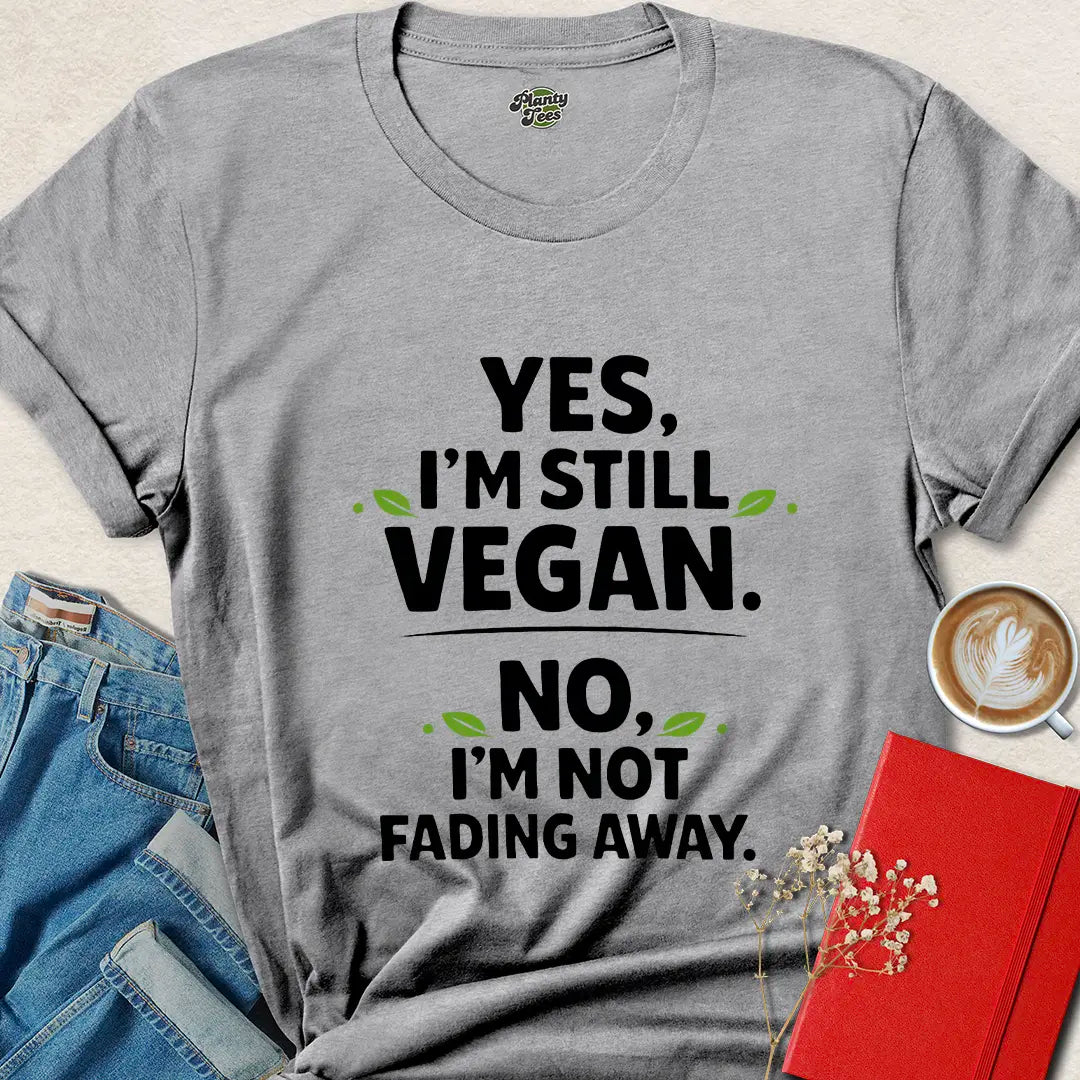 Funny Vegan Shirt – Yes I’m Still Vegan, No I’m Not Fading Away Tee | Bold Plant-Based Apparel | Limited-Time Drop