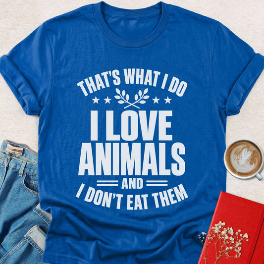 Royal blue T-shirt with bold 'I love animals' graphic and 'Don't eat them' text