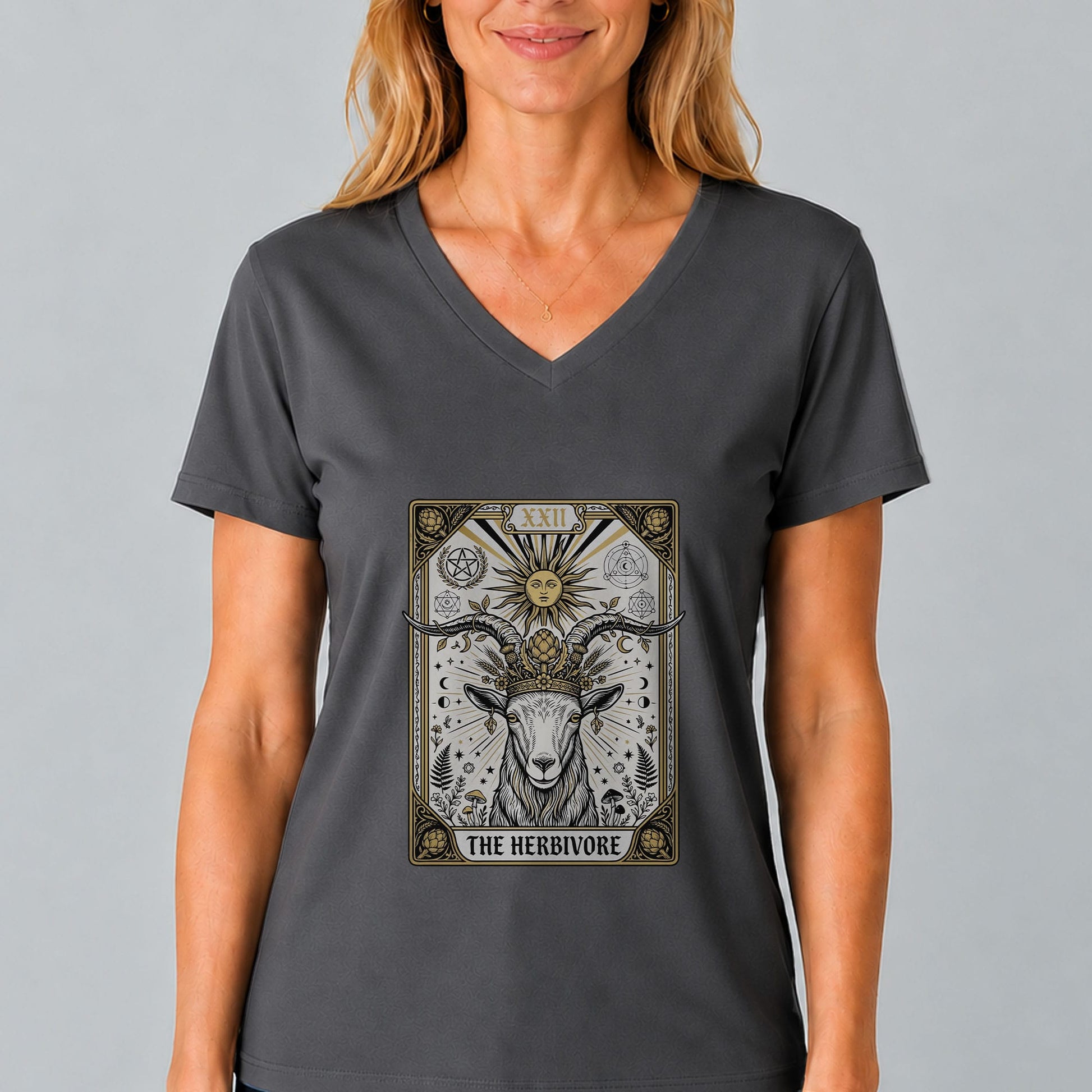 Charcoal V-neck tee with centered tarot-style "THE HERBIVORE" graphic