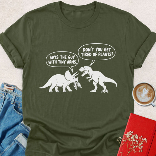 Military green graphic short-sleeve T-shirt with dinosaur trio and speech-bubble slogan