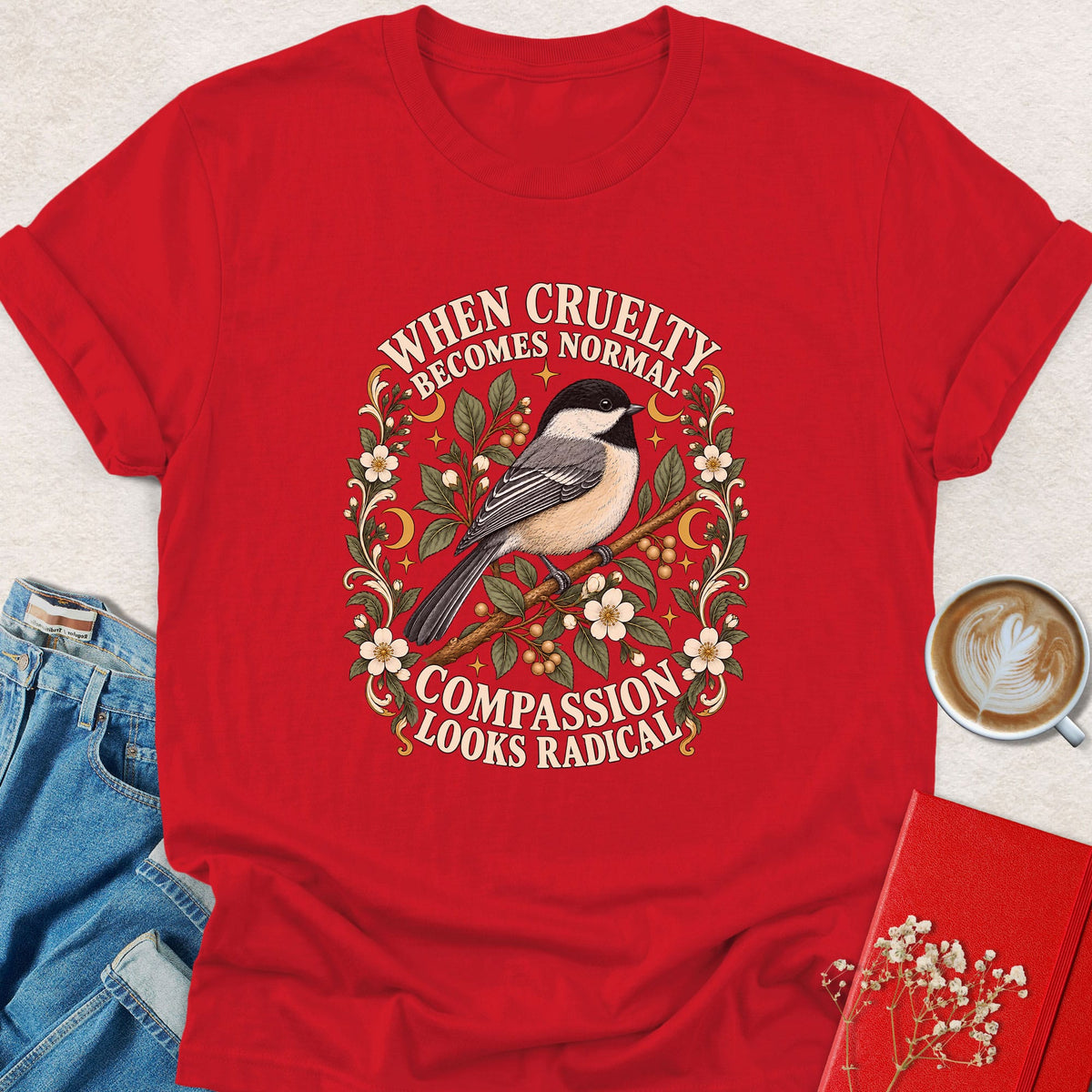 Red bird graphic t-shirt with floral slogan print on front