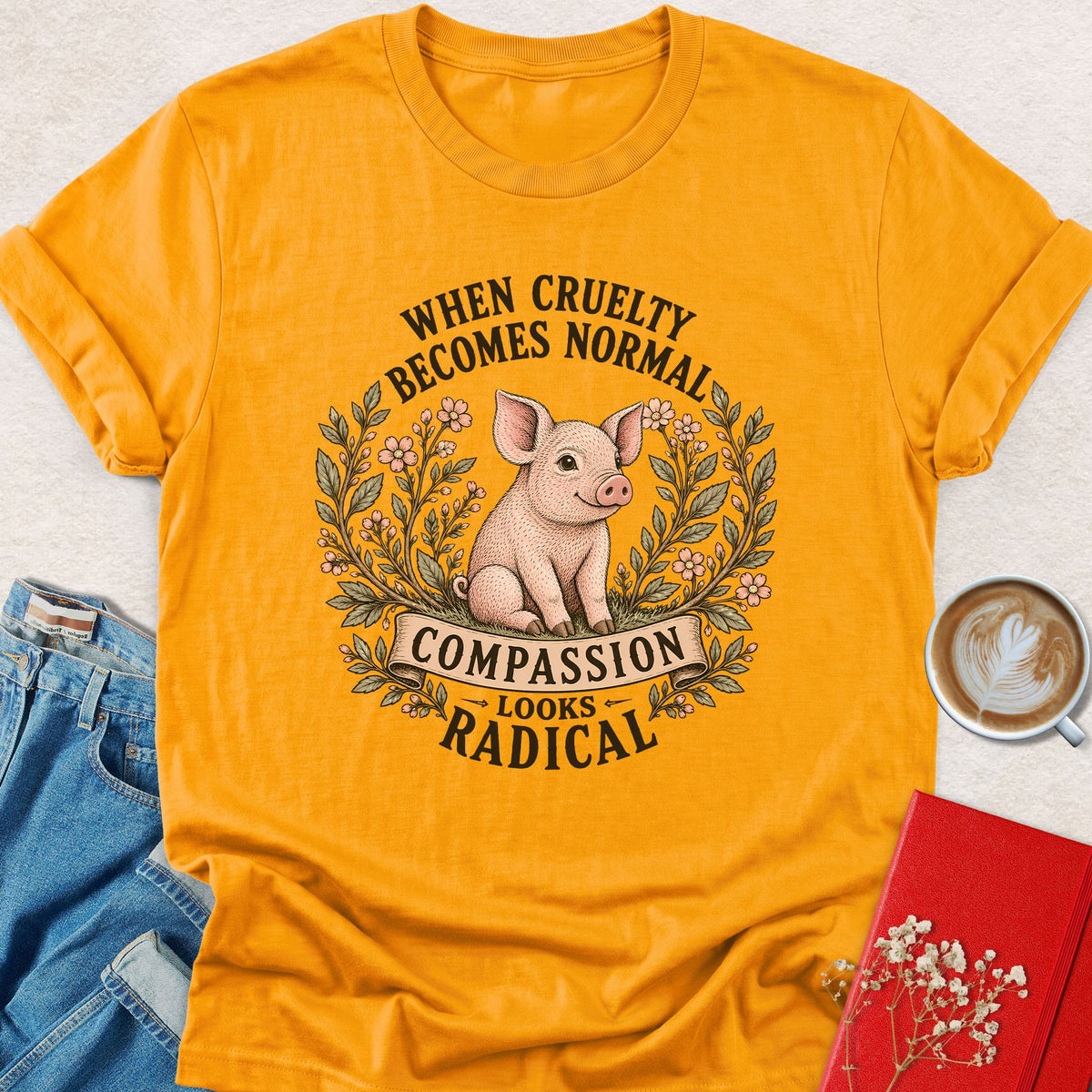 Yellow pig graphic t-shirt with floral wreath and quote text, crew neck