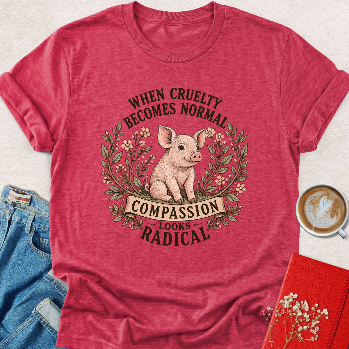 Red pig graphic t-shirt with floral wreath and quote text, crew neck